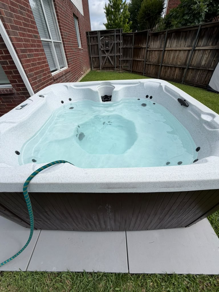 The same hot tub refilled with clear water